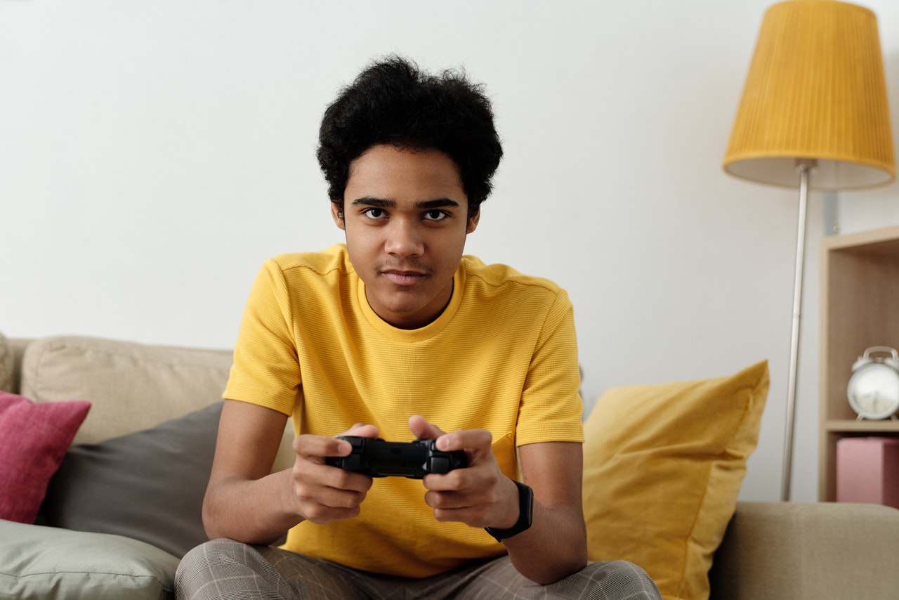 Teen playing video games